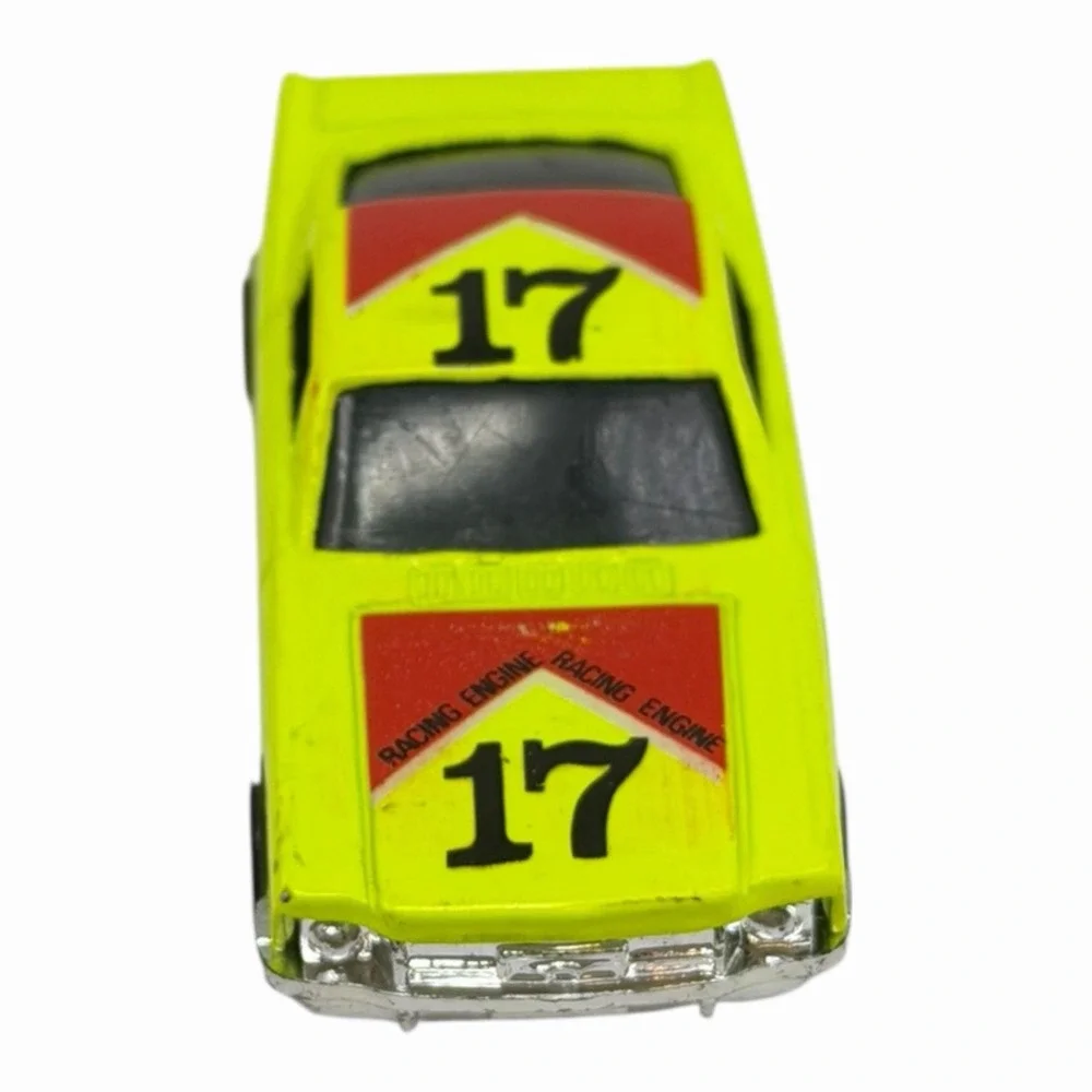 Vintage Yellow Diecast Toy Car with Racing Decals‎